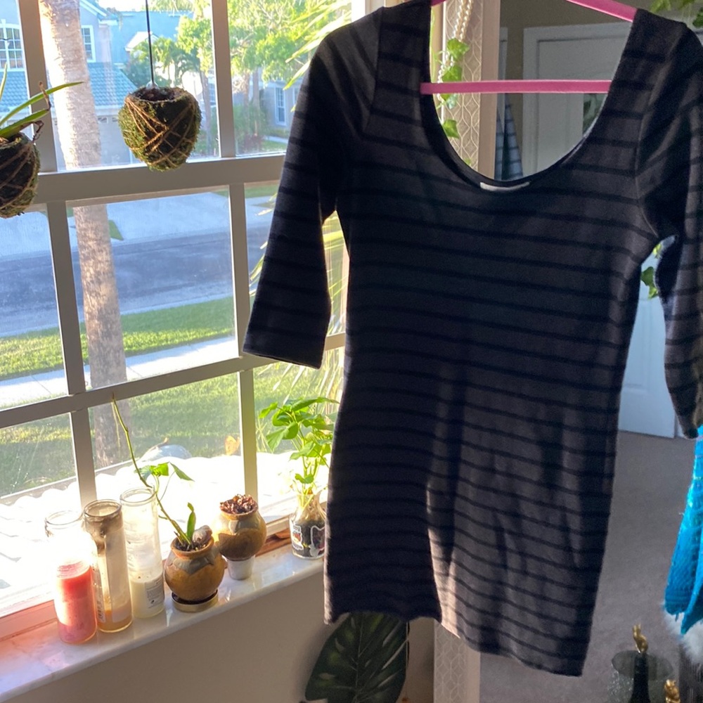 Beautiful, black and gray three-quarter sleeve, tight fitting mini dress